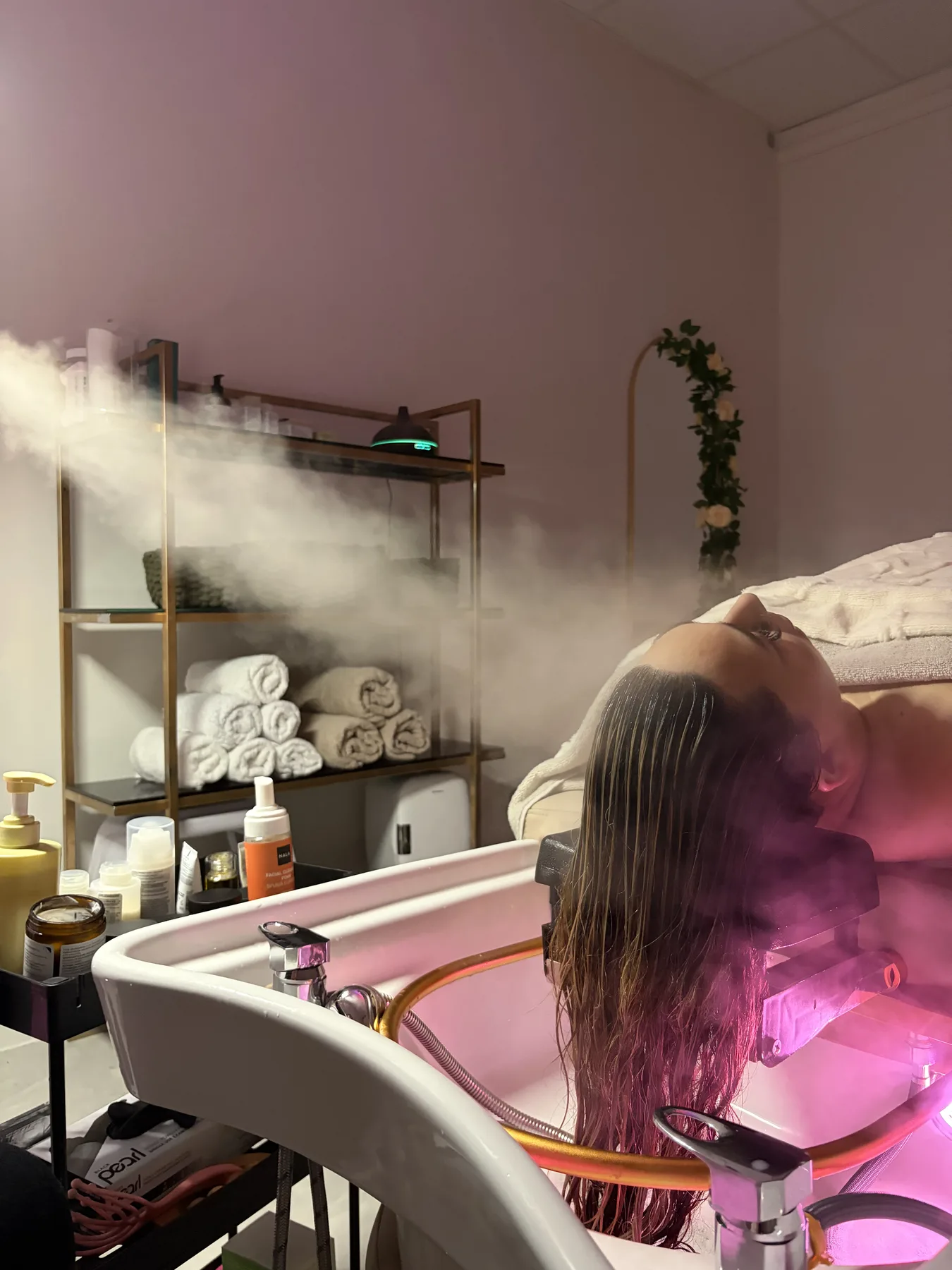 Aromatherapy steam during a head spa treatment
