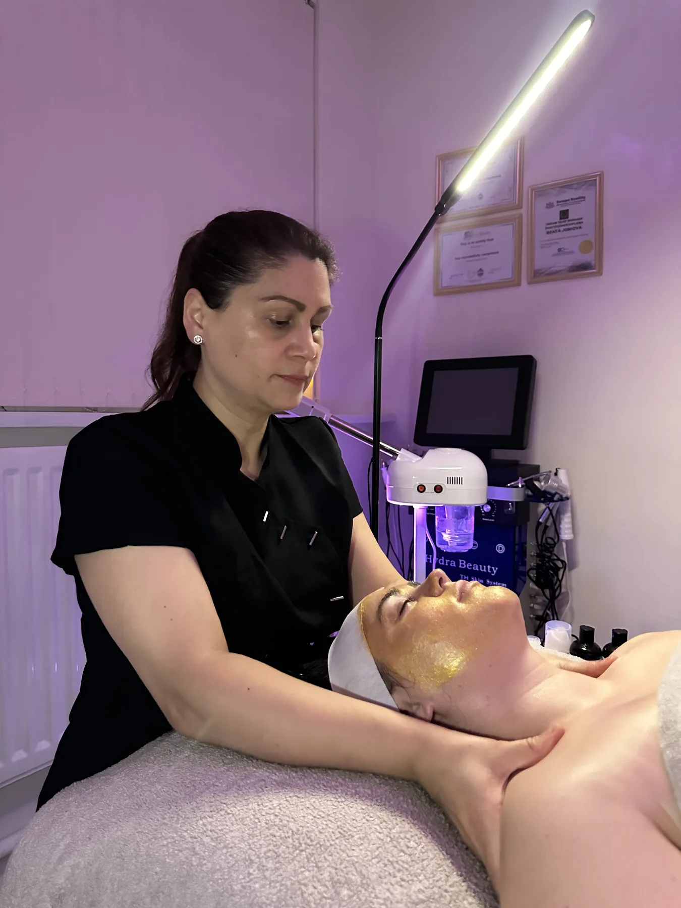 Bea recommending a natural, organic Evolve product during a treatment